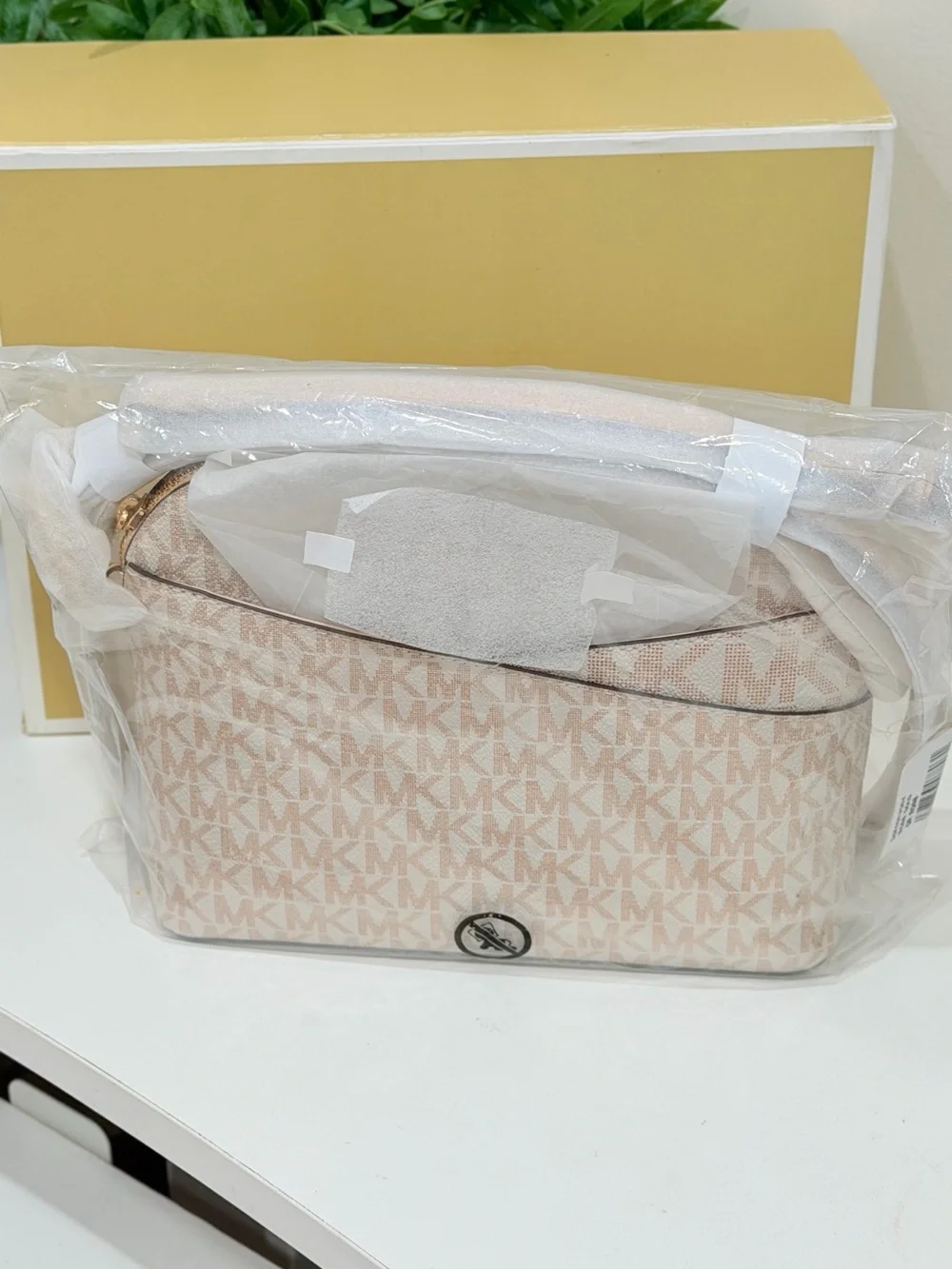 Michael Kors Jet Set Travel Medium Logo Dome Crossbody Bag in the powder blush